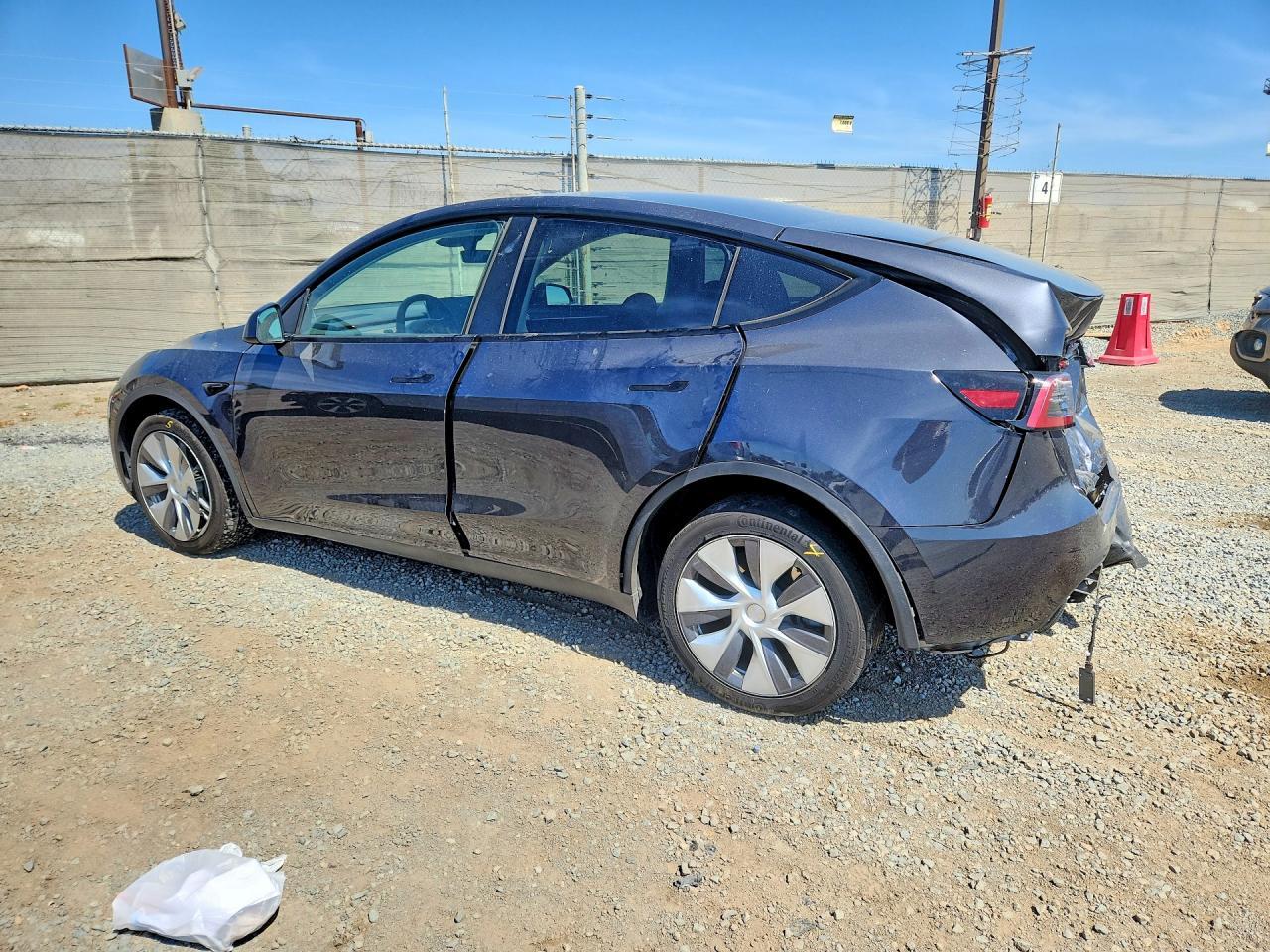 2024 Tesla Model Y - Фото 2