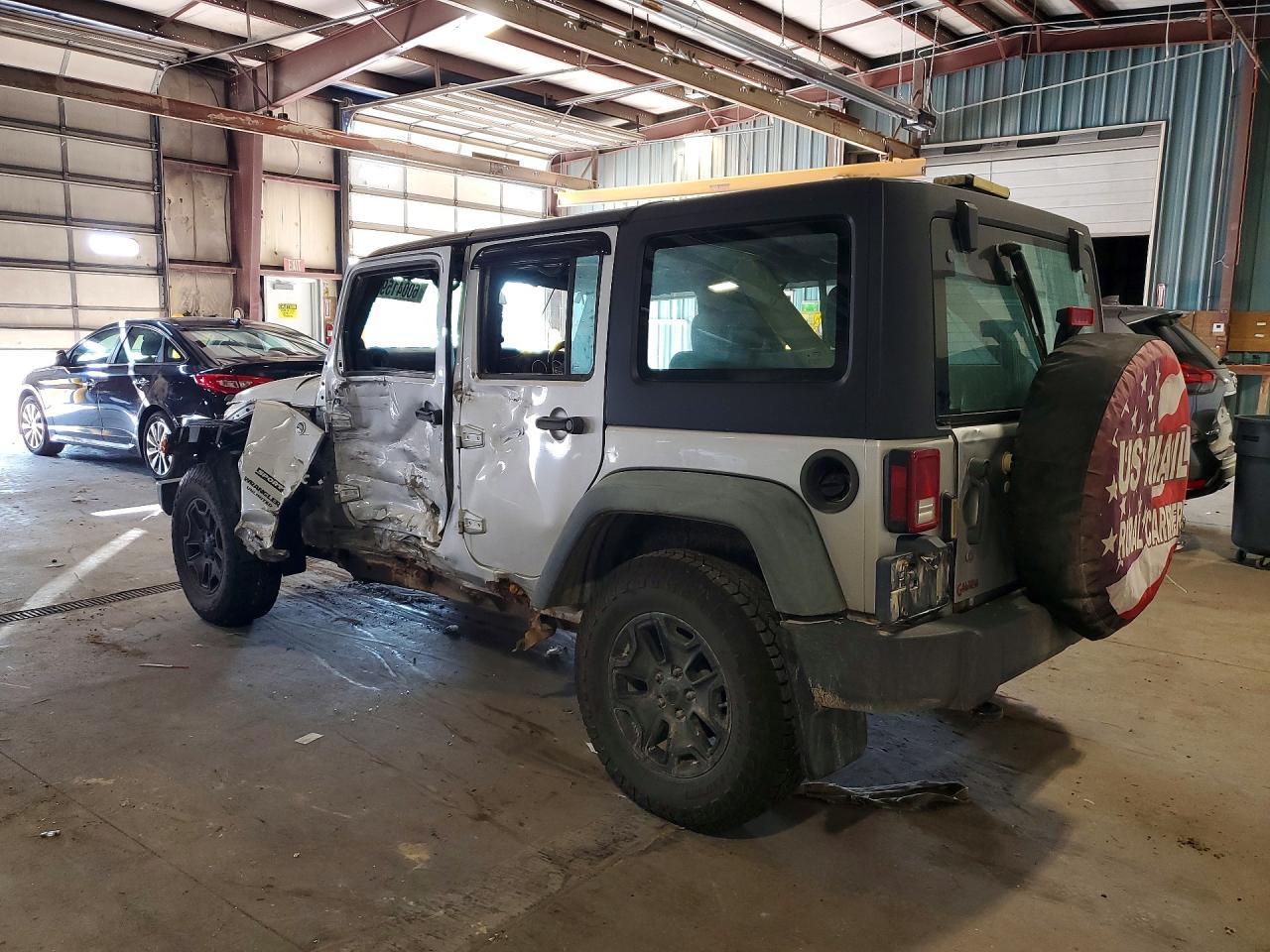 2011 Jeep Wrangler Unlimited Sport - Фото 2