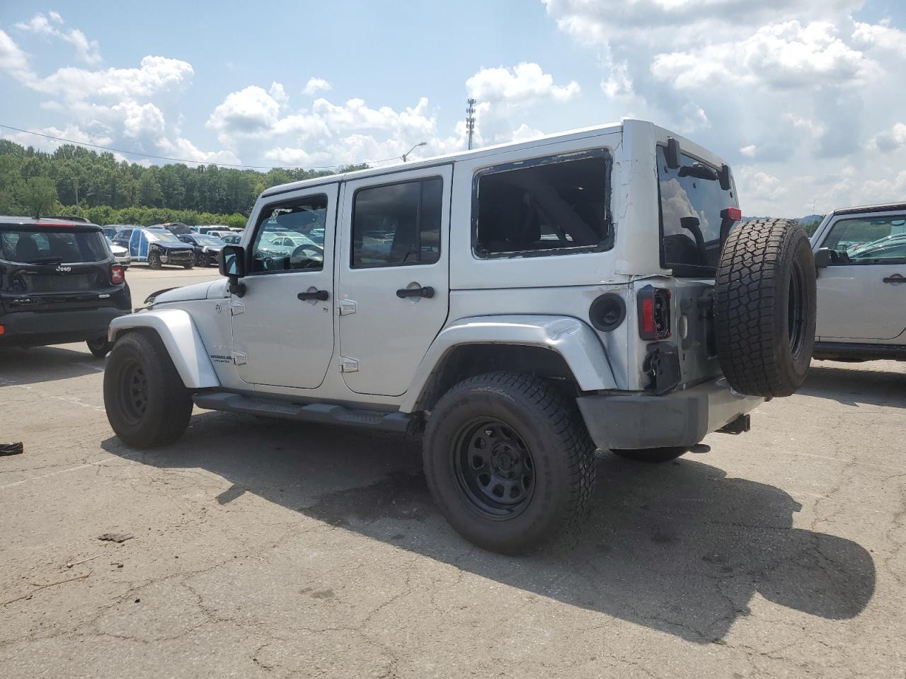 2012 Jeep Wrangler Unlimited Sahara - Фото 2