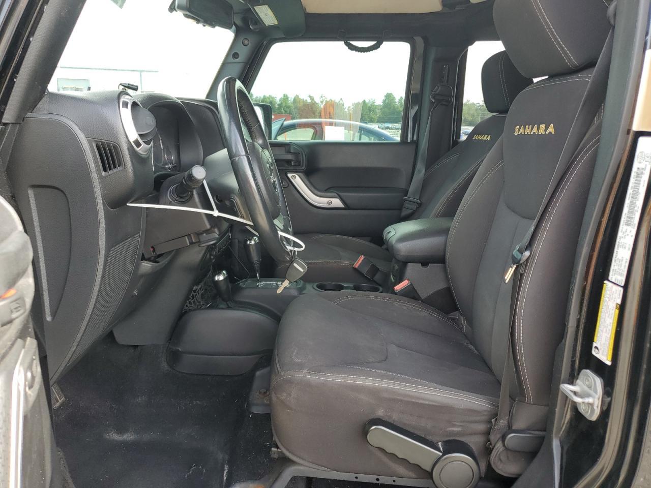 2013 Jeep Wrangler Unlimited Sahara - Фото 7