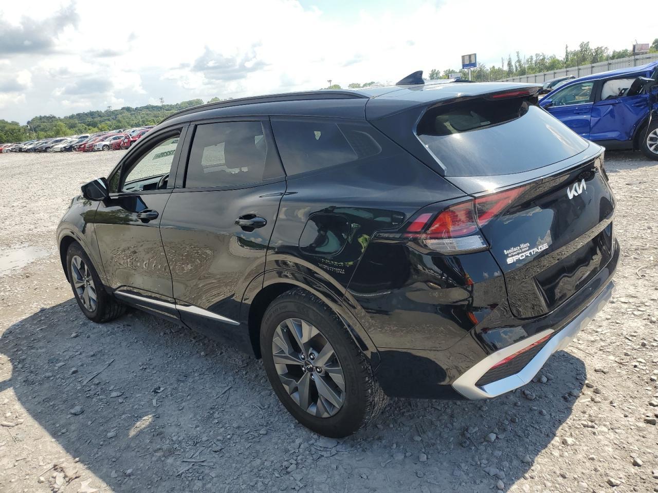 2023 Kia Sportage Sx - Фото 2