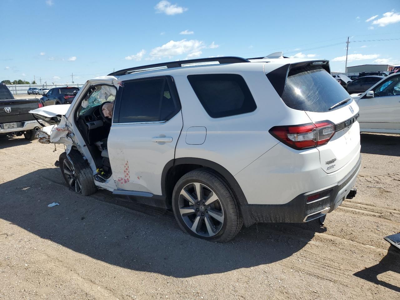 2025 Honda Pilot Touring - Фото 2