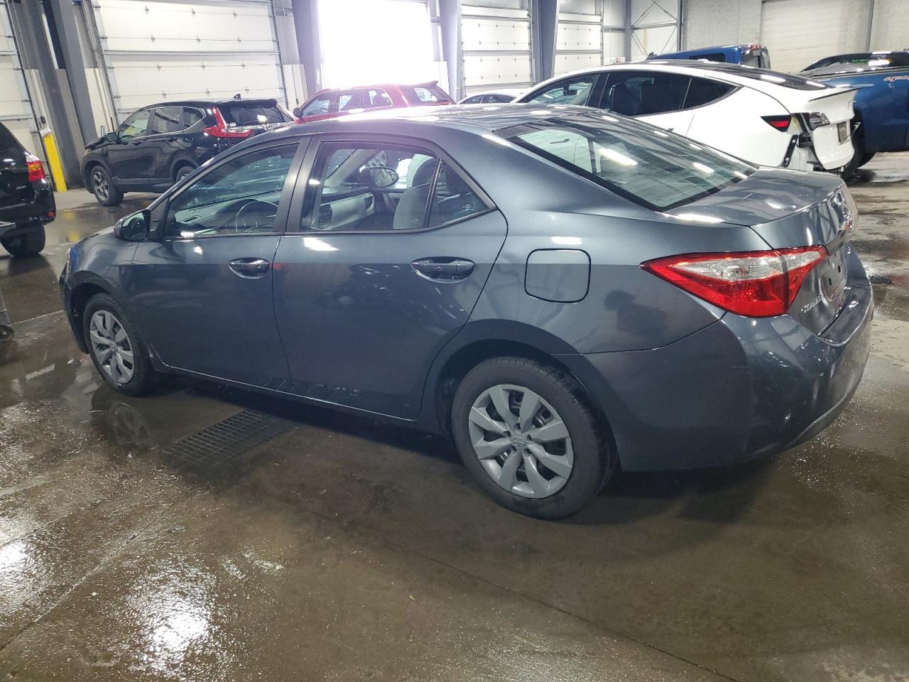 2014 Toyota Corolla L - Фото 2