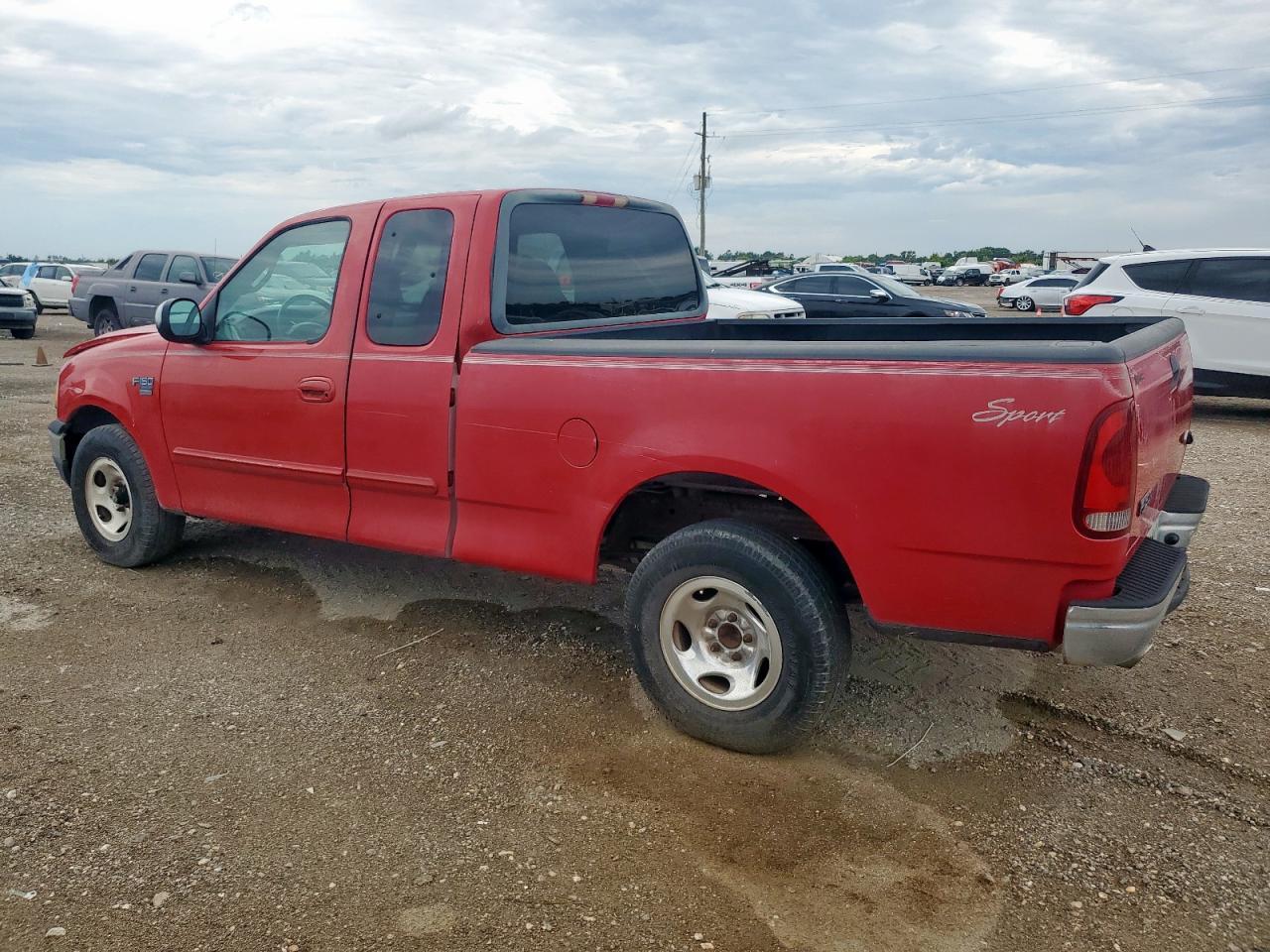 2001 Ford F150 - Фото 2