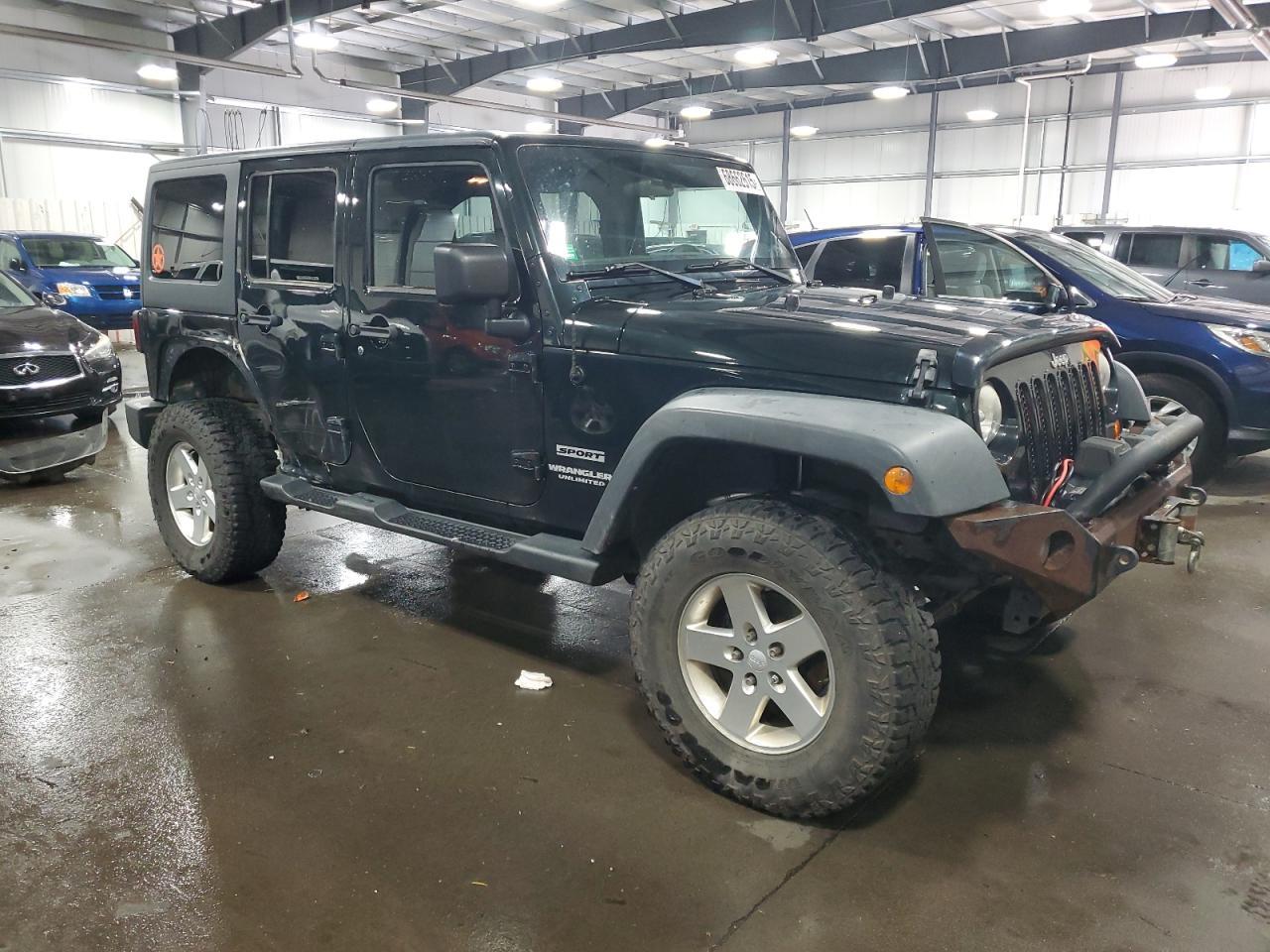 2012 Jeep Wrangler Unlimited Sport - Фото 4
