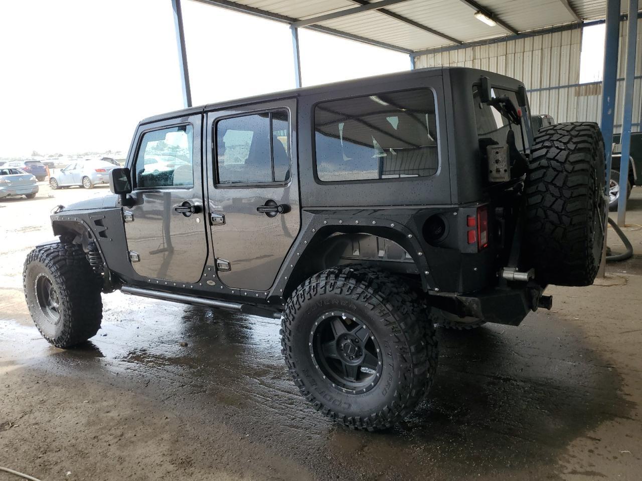 2014 Jeep Wrangler Unlimited Sport - Фото 2