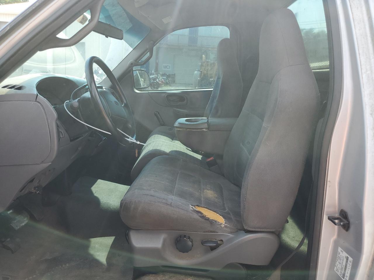 2002 Ford F150 - Фото 7