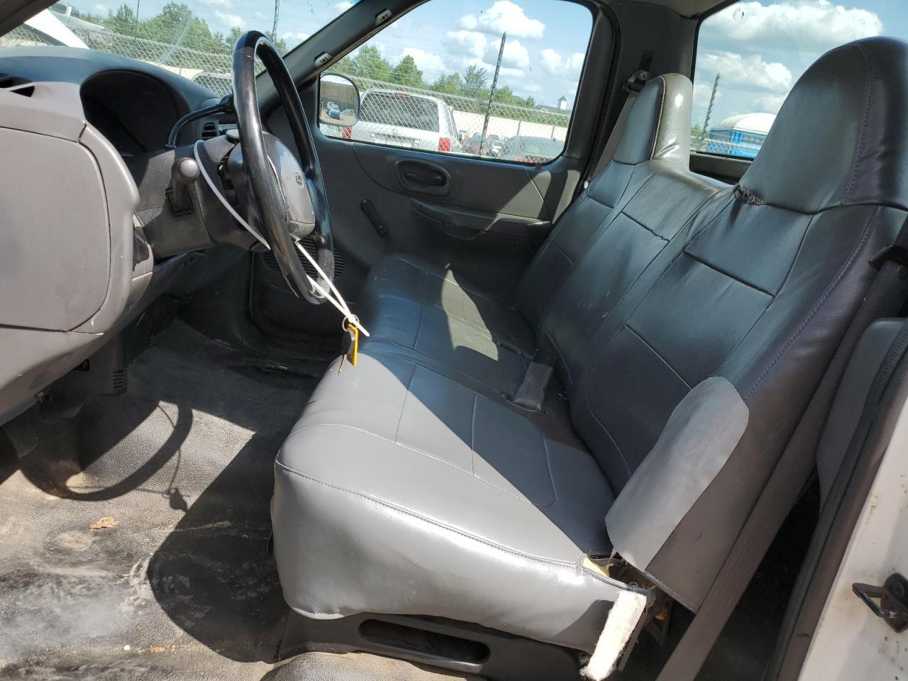 2001 Ford F150 - Фото 7