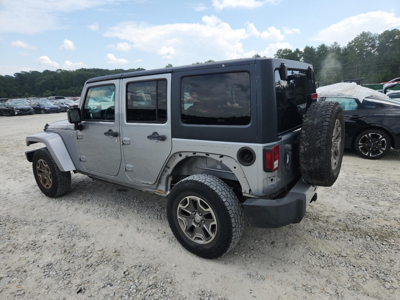 2013 Jeep Wrangler Unlimited Sahara - Фото 2