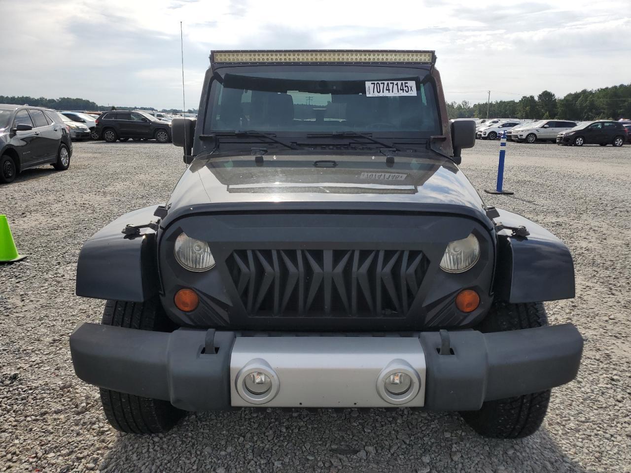 2013 Jeep Wrangler Unlimited Sahara - Фото 5