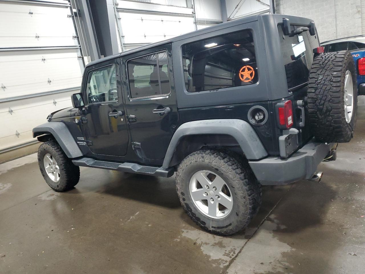 2012 Jeep Wrangler Unlimited Sport - Фото 2