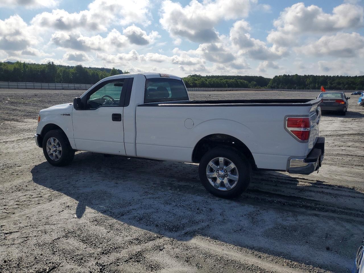 2014 Ford F150 - Фото 2