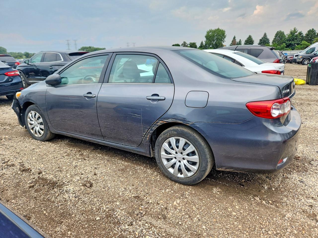 2013 Toyota Corolla Le - Фото 2