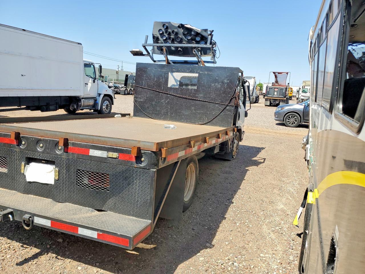 2024 Isuzu Npr Hd Flatbed Truck - Image 3