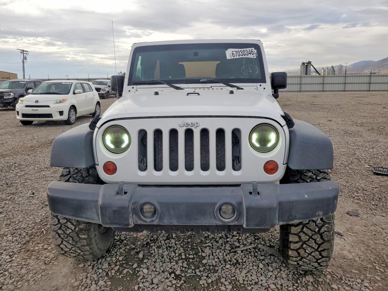 2012 Jeep Wrangler Unlimited Sport - Фото 5