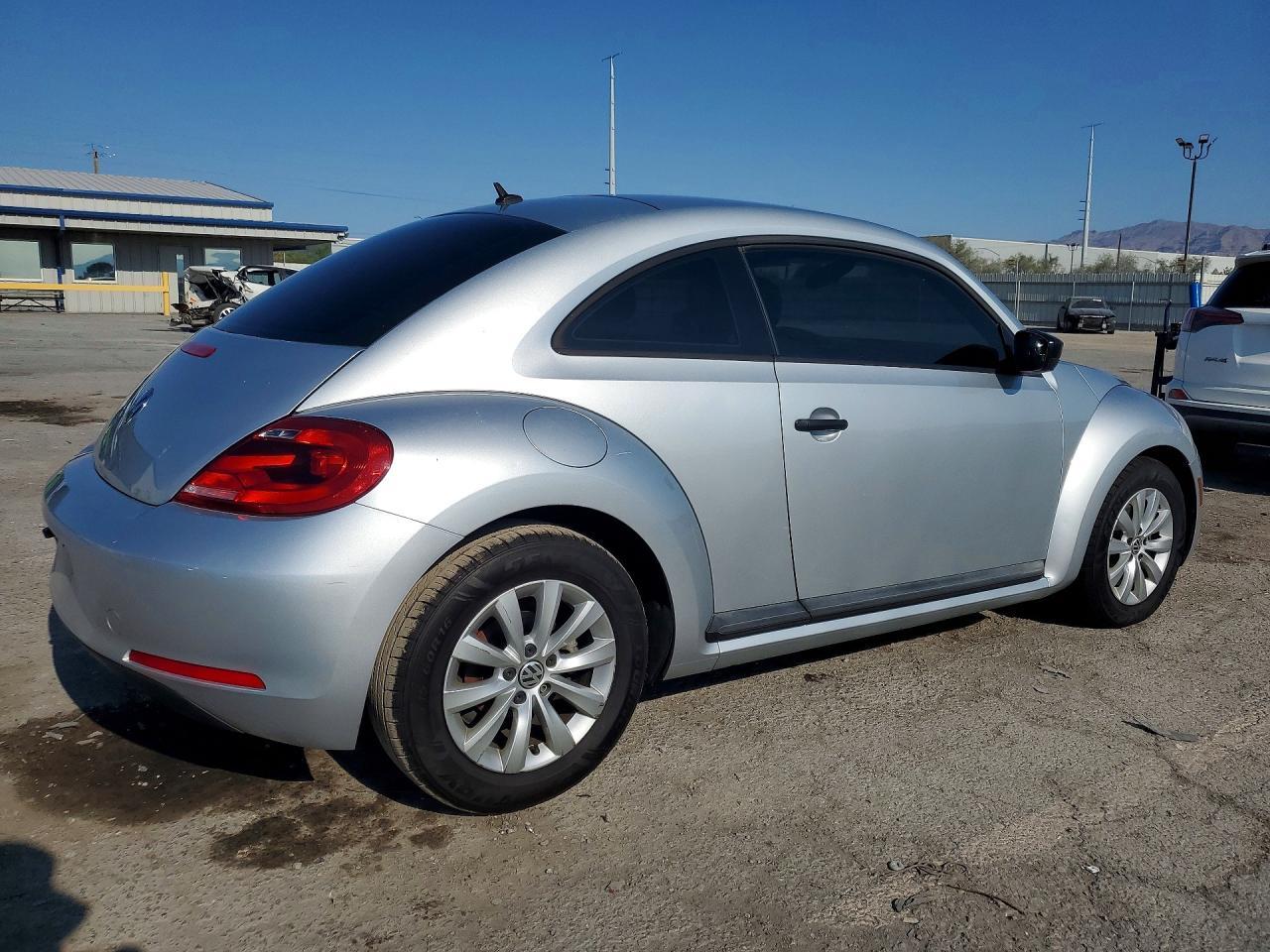 2014 Volkswagen Beetle - Фото 3