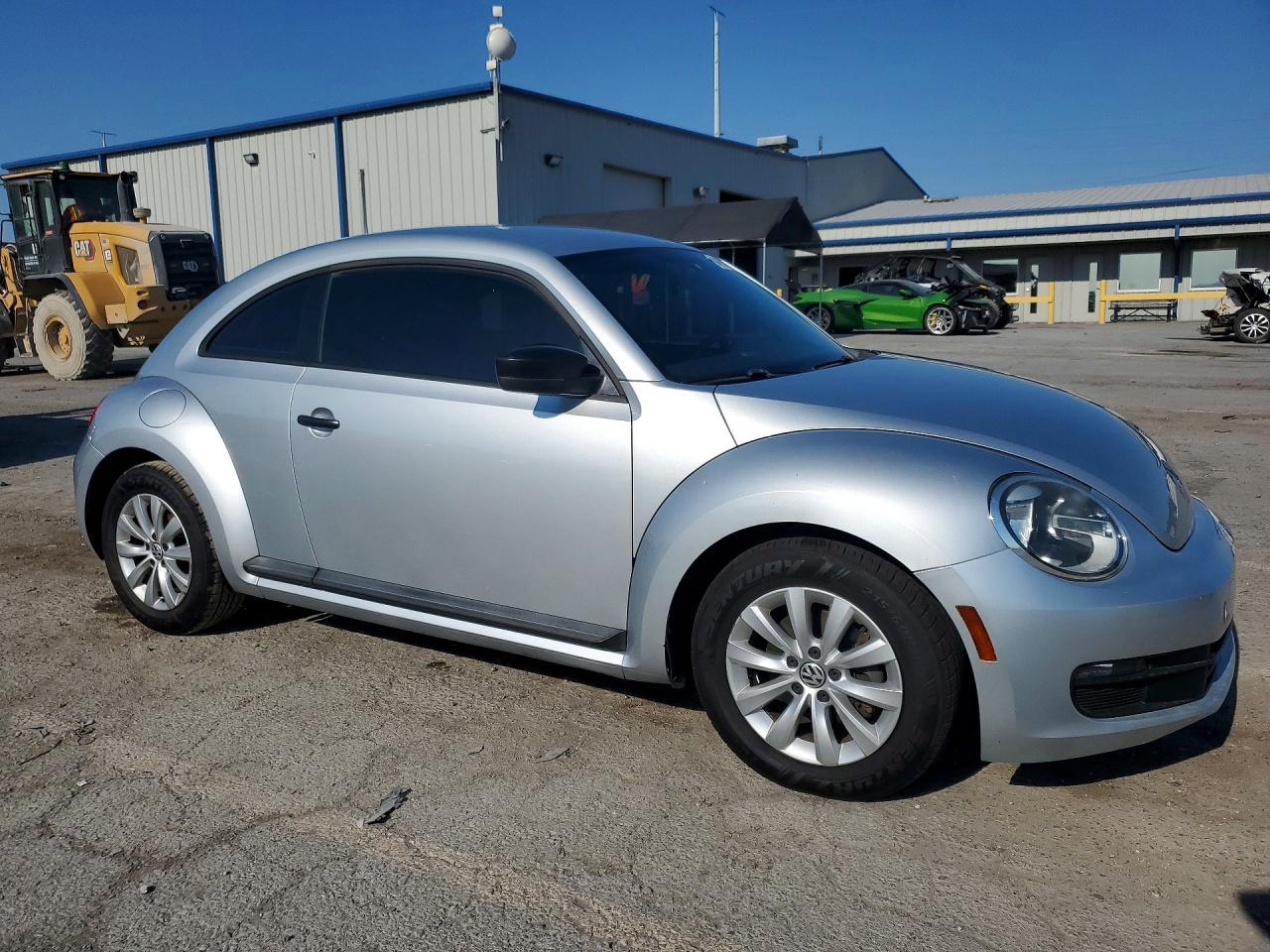 2014 Volkswagen Beetle - Фото 4