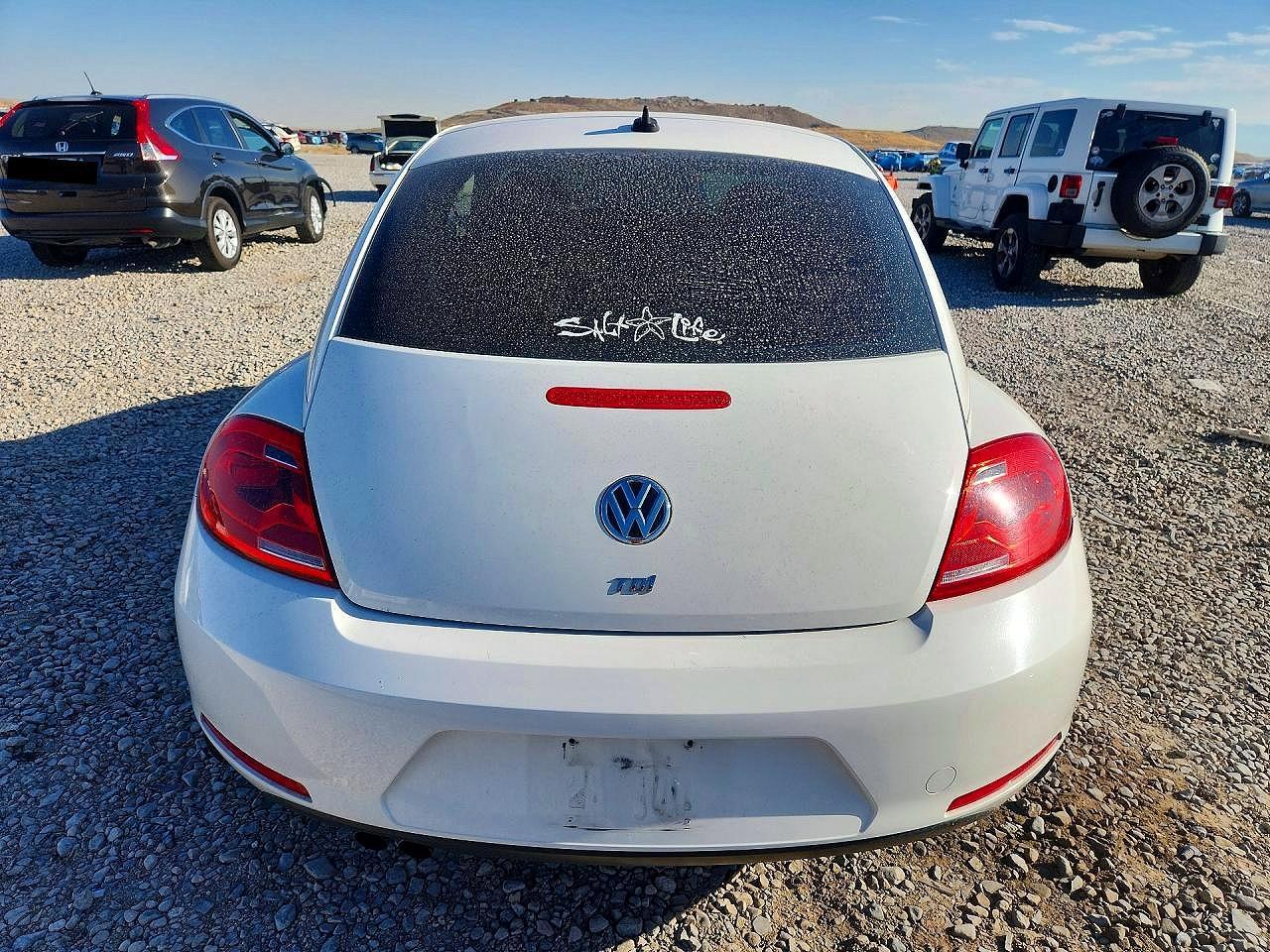 2014 Volkswagen Beetle - Фото 6