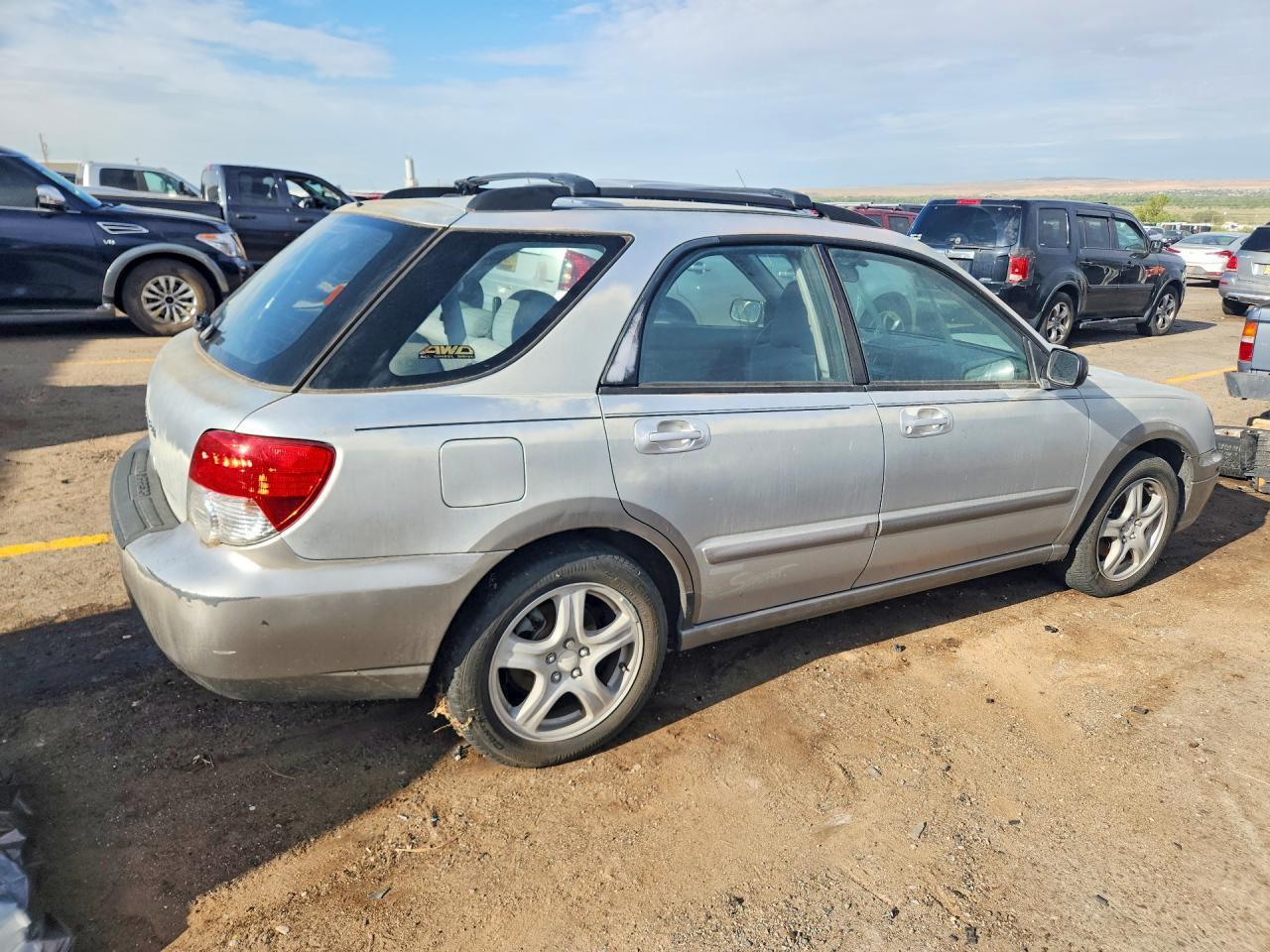 2004 Subaru Impreza Outback Sport - Фото 3
