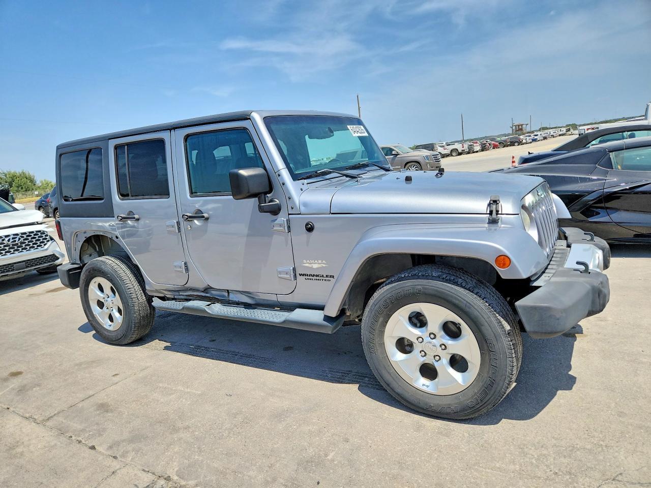 2014 Jeep Wrangler Unlimited Sahara - Фото 4