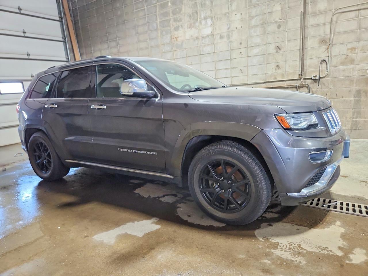 2014 Jeep Grand Cherokee Summit - Фото 4