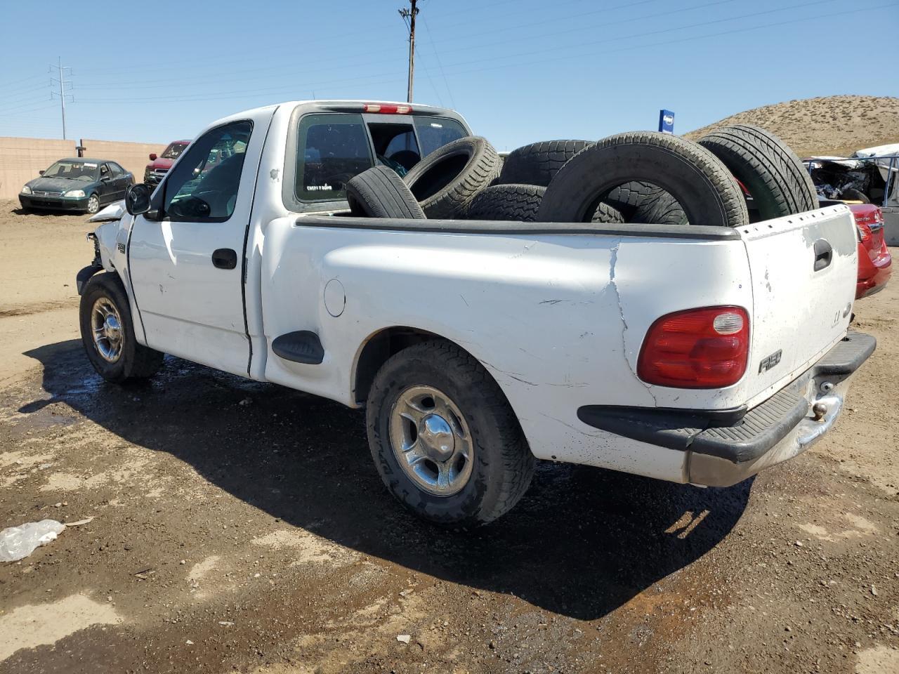 2000 Ford F150 - Фото 2