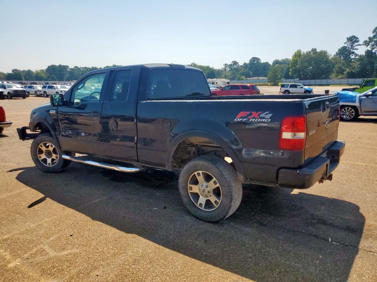 2004 Ford F150 - Фото 2