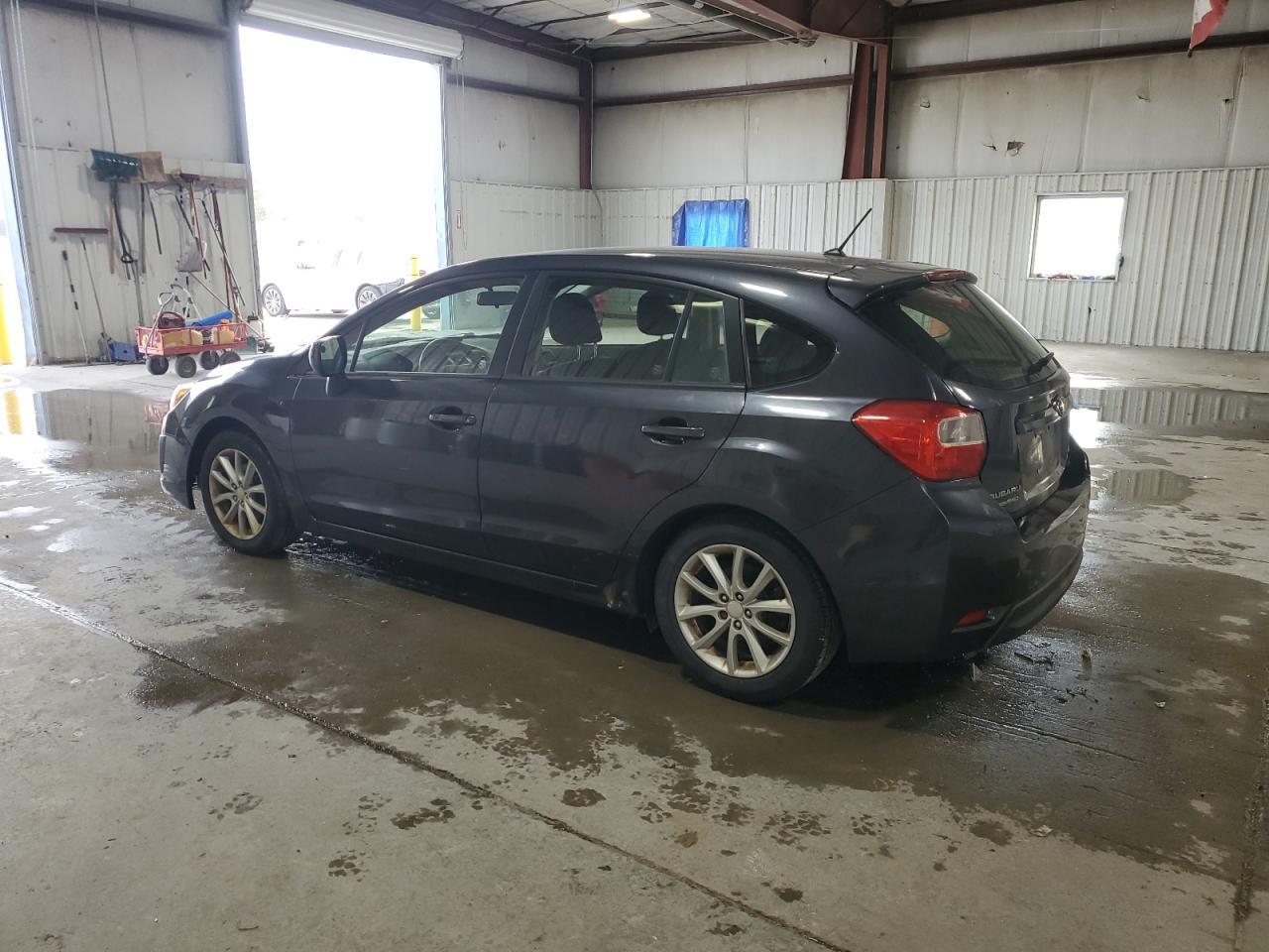 2014 Subaru Impreza Premium - Фото 2