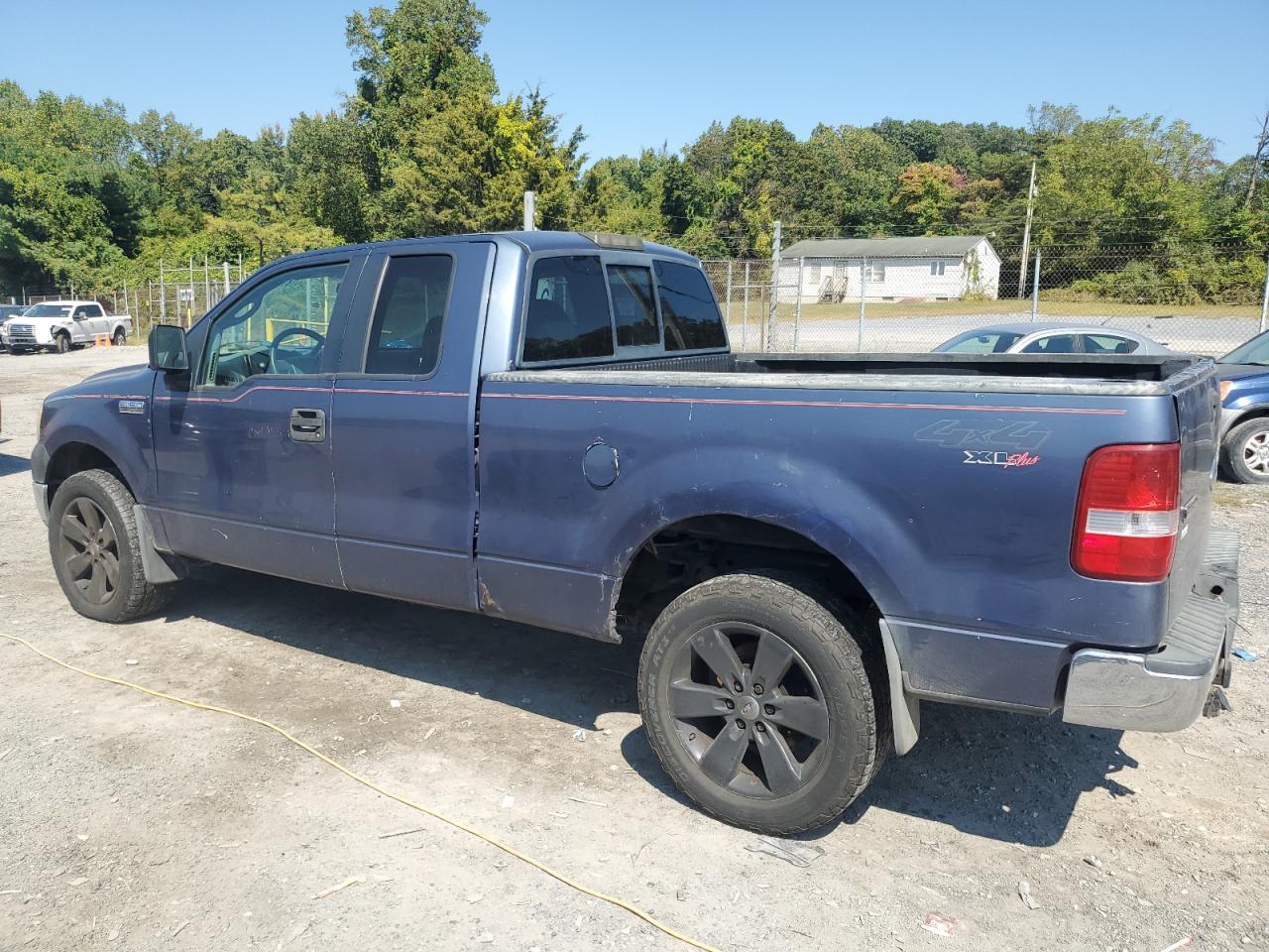 2005 Ford F150 - Фото 2