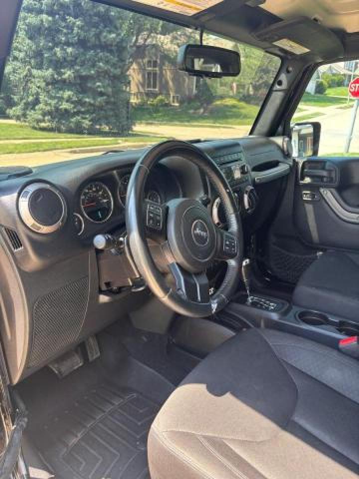 2016 Jeep Wrangler Unlimited Sport - Фото 5