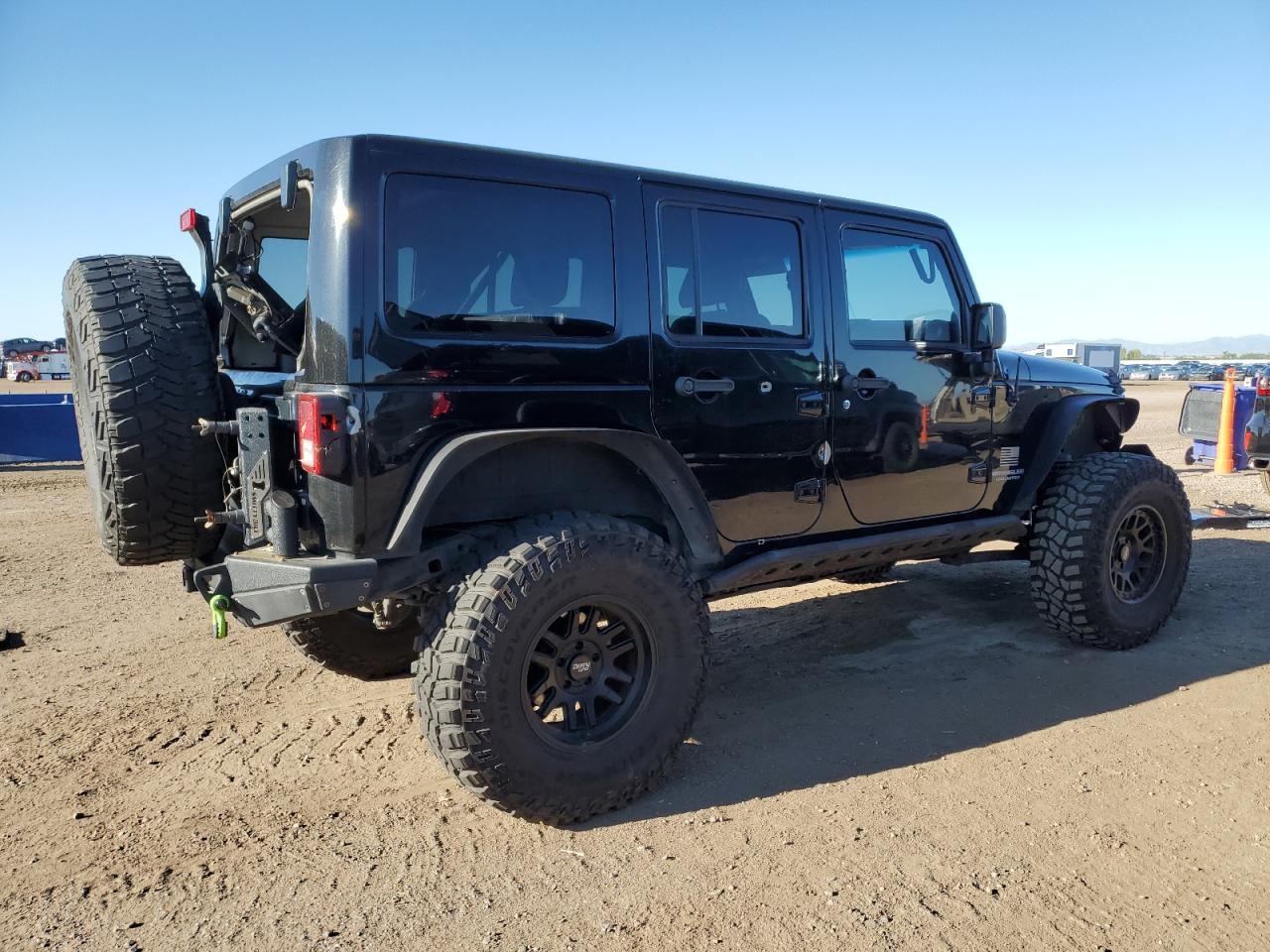 2014 Jeep Wrangler Unlimited Sahara - Фото 3