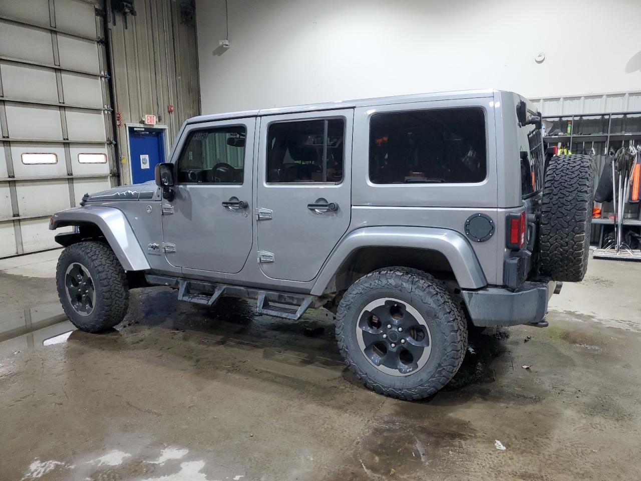 2014 Jeep Wrangler Unlimited Sahara - Фото 2