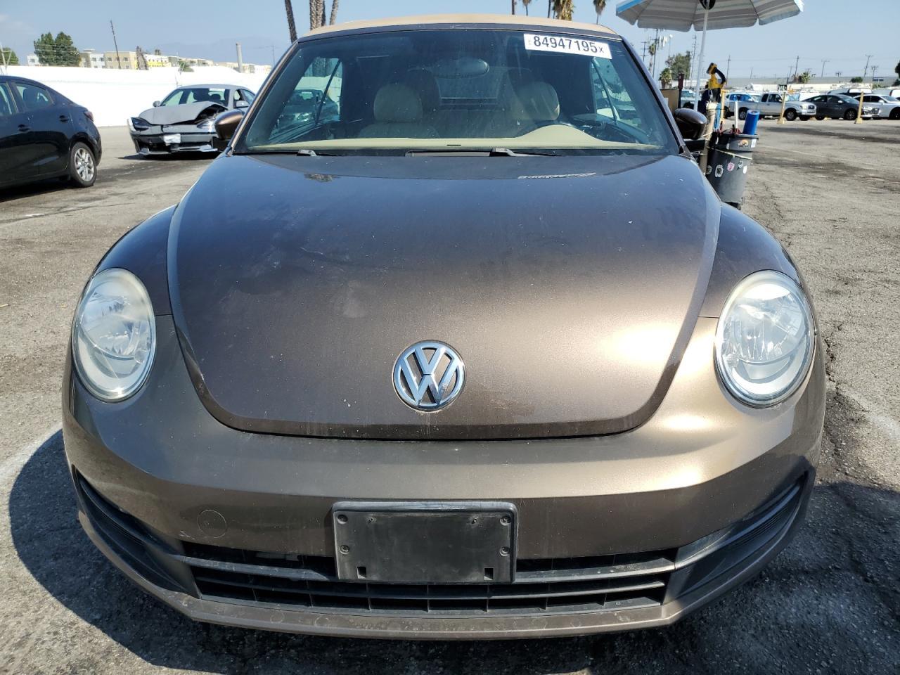 2015 Volkswagen Beetle 1.8T - Фото 5