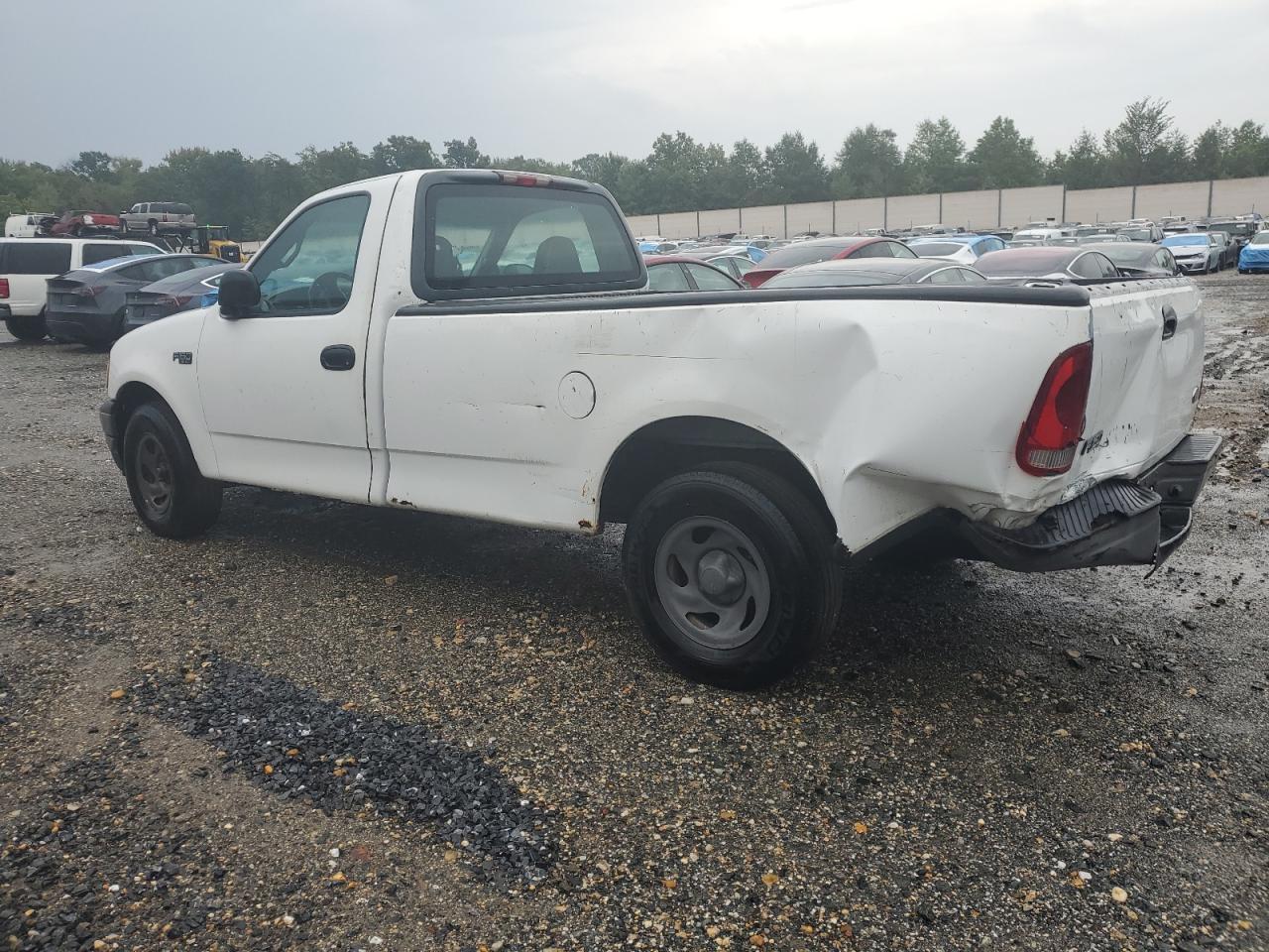 2001 Ford F150 - Фото 2