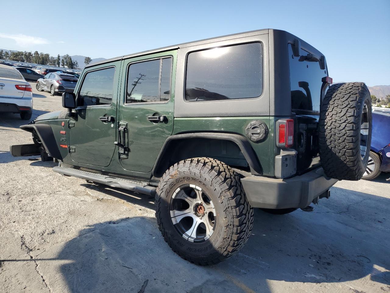 2011 Jeep Wrangler Unlimited Sport - Фото 2