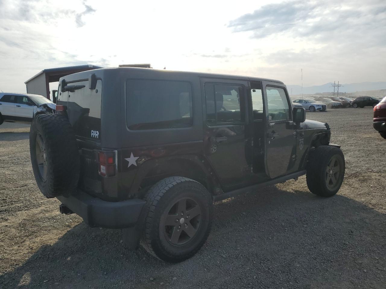 2011 Jeep Wrangler Unlimited Rubicon - Фото 3