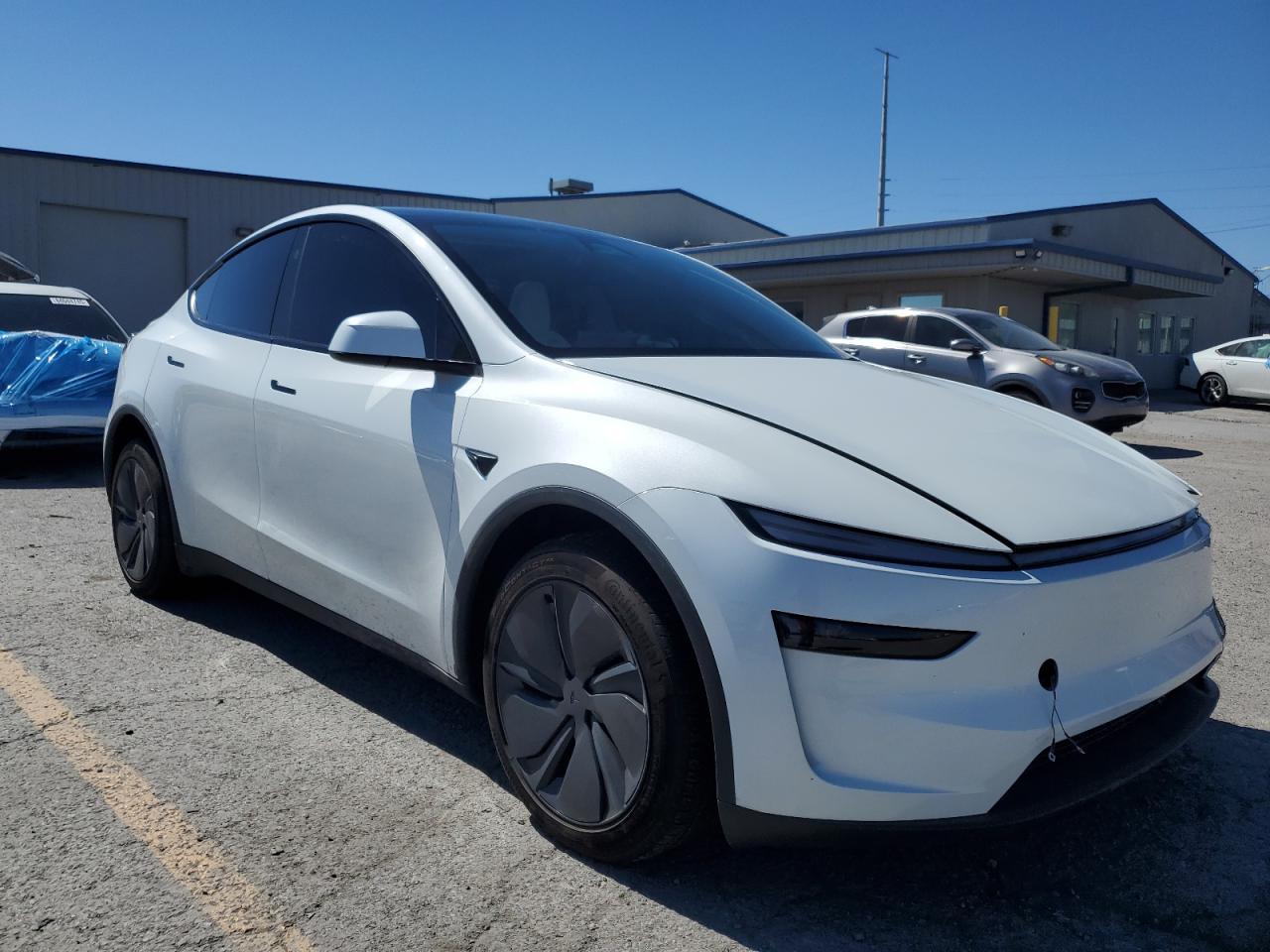 2026 Tesla Model Y - Фото 4