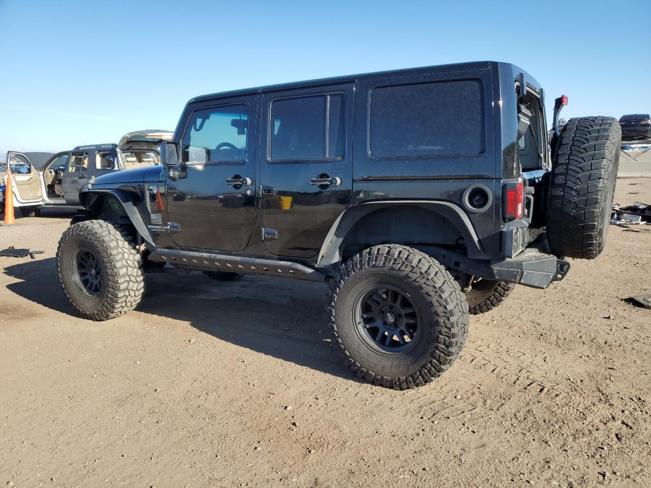 2014 Jeep Wrangler Unlimited Sahara - Фото 2