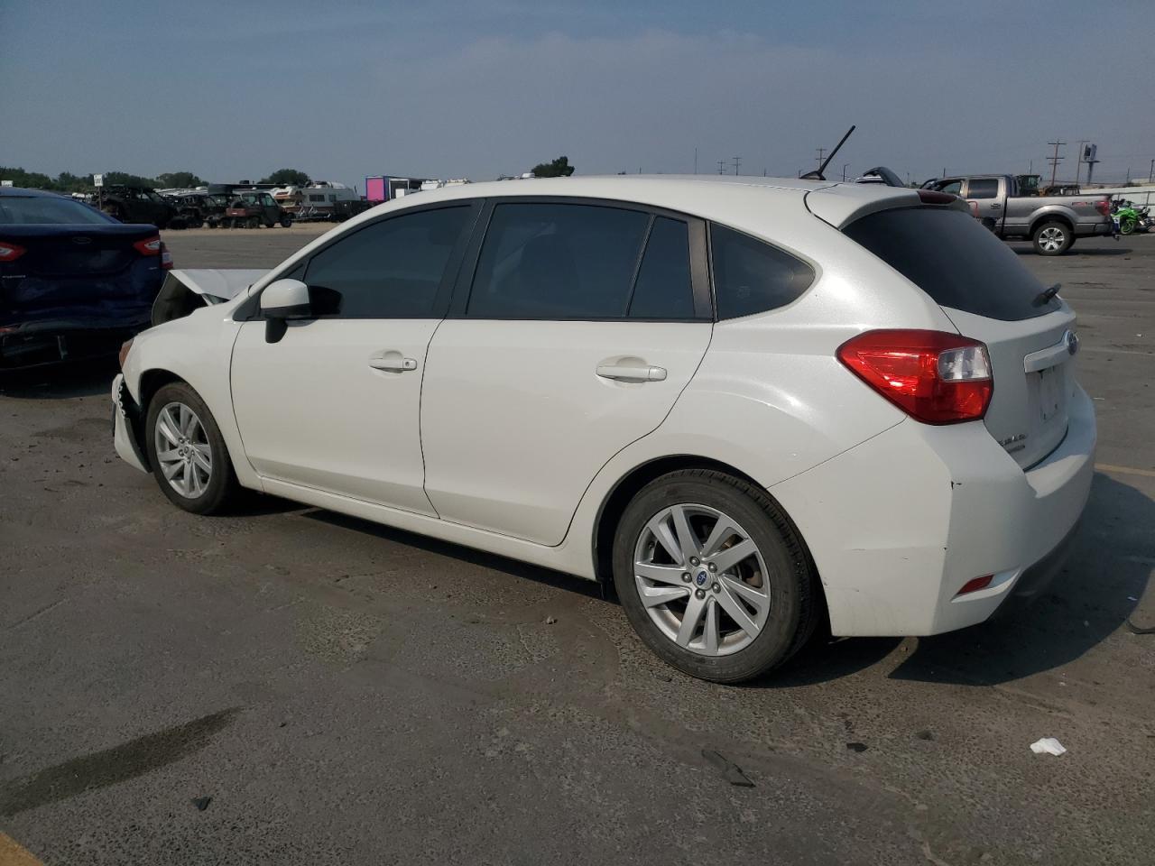 2016 Subaru Impreza Premium - Фото 2