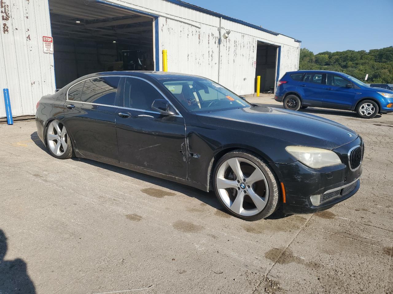 2011 BMW 750 Li - Фото 4