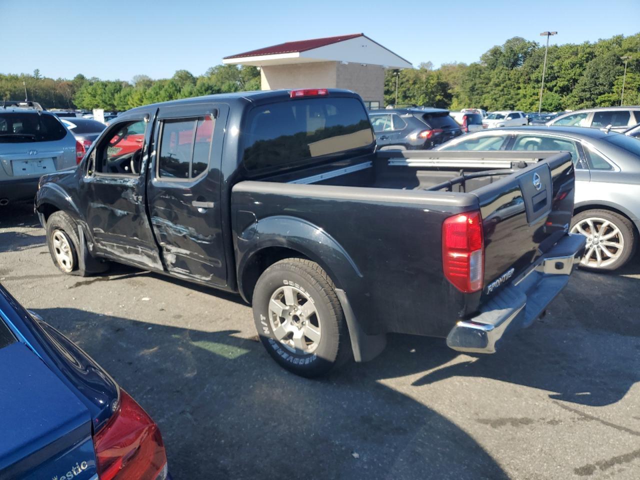 2008 Nissan Frontier Crew Cab Le - Фото 2