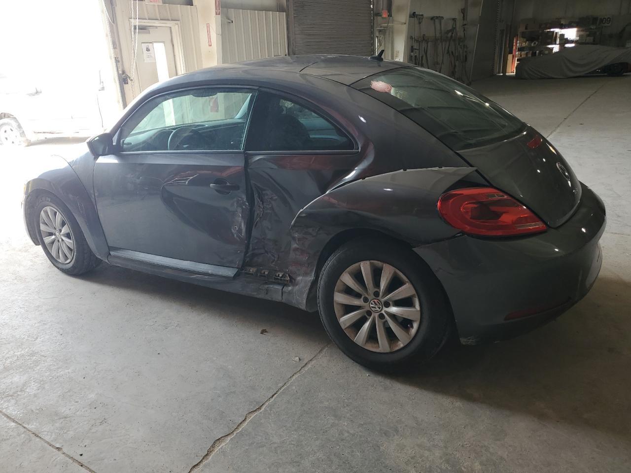 2016 Volkswagen Beetle 1.8T - Фото 2