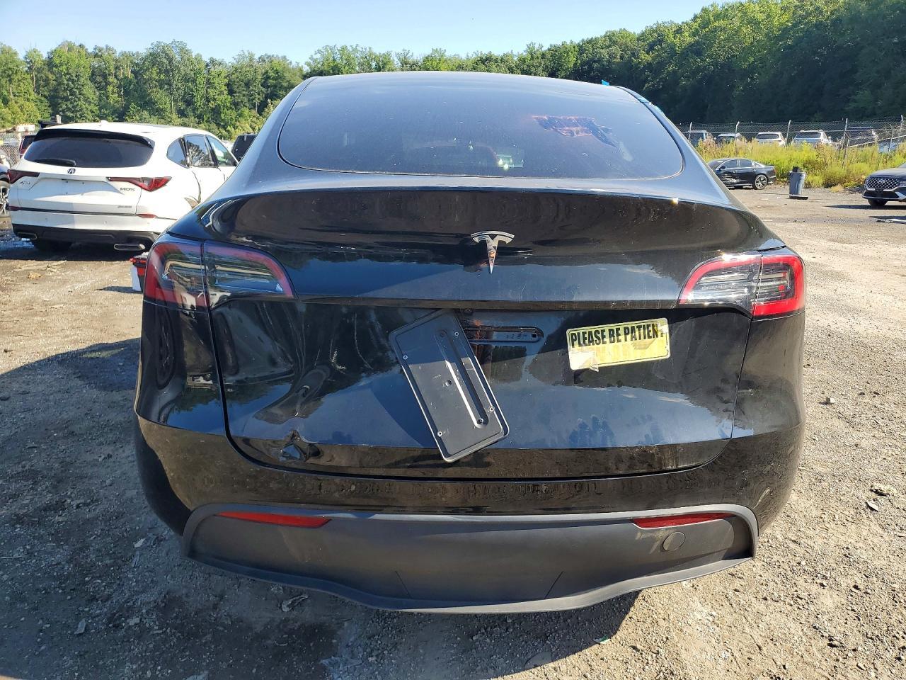2025 Tesla Model Y - Фото 6