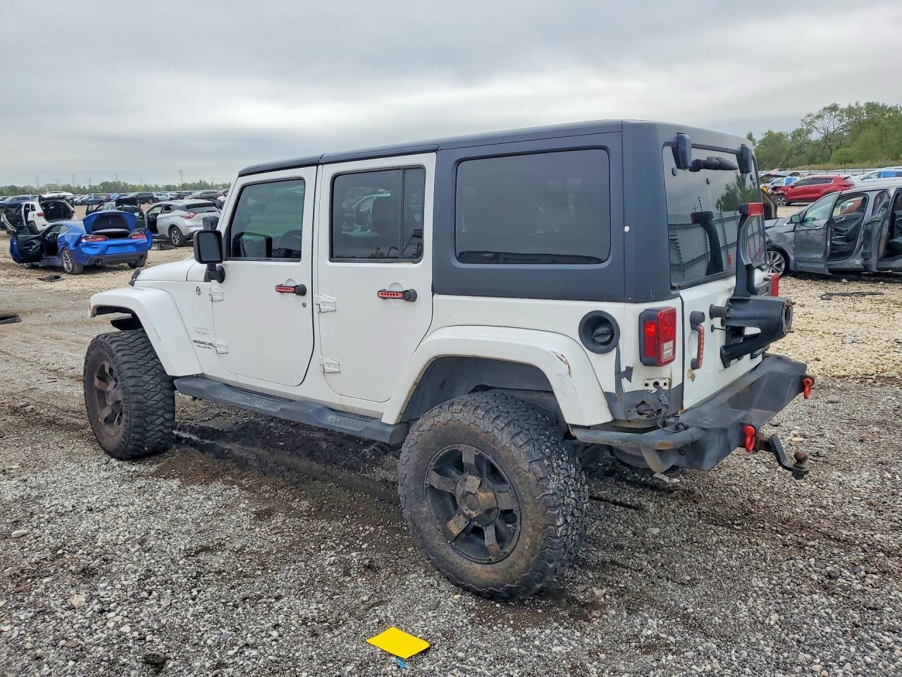 2011 Jeep Wrangler Unlimited Sahara - Image 2