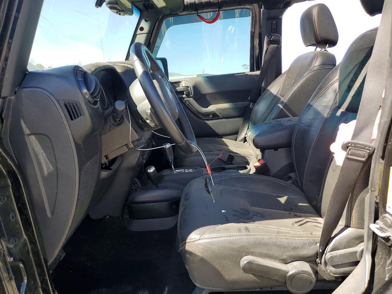 2014 Jeep Wrangler Unlimited Sahara - Фото 7