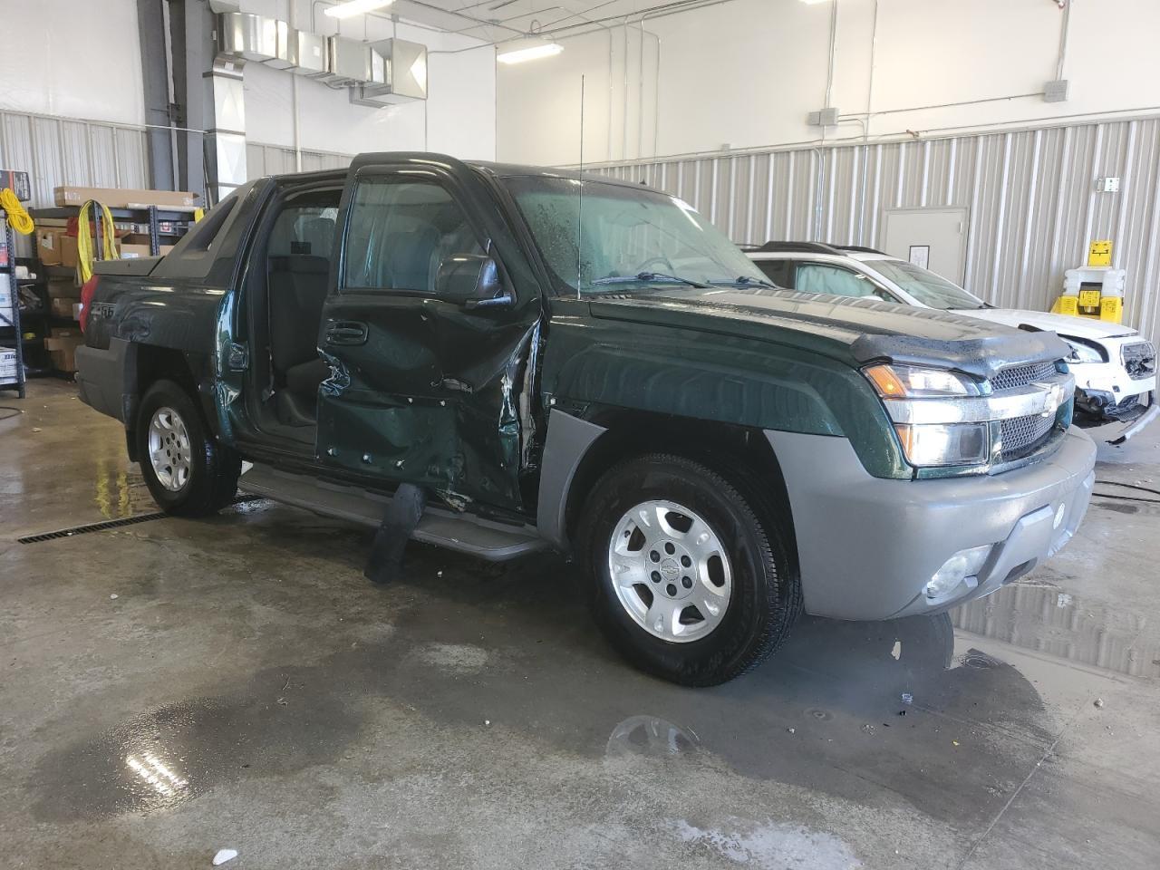 2002 Chevrolet Avalanche C1500 - Фото 4