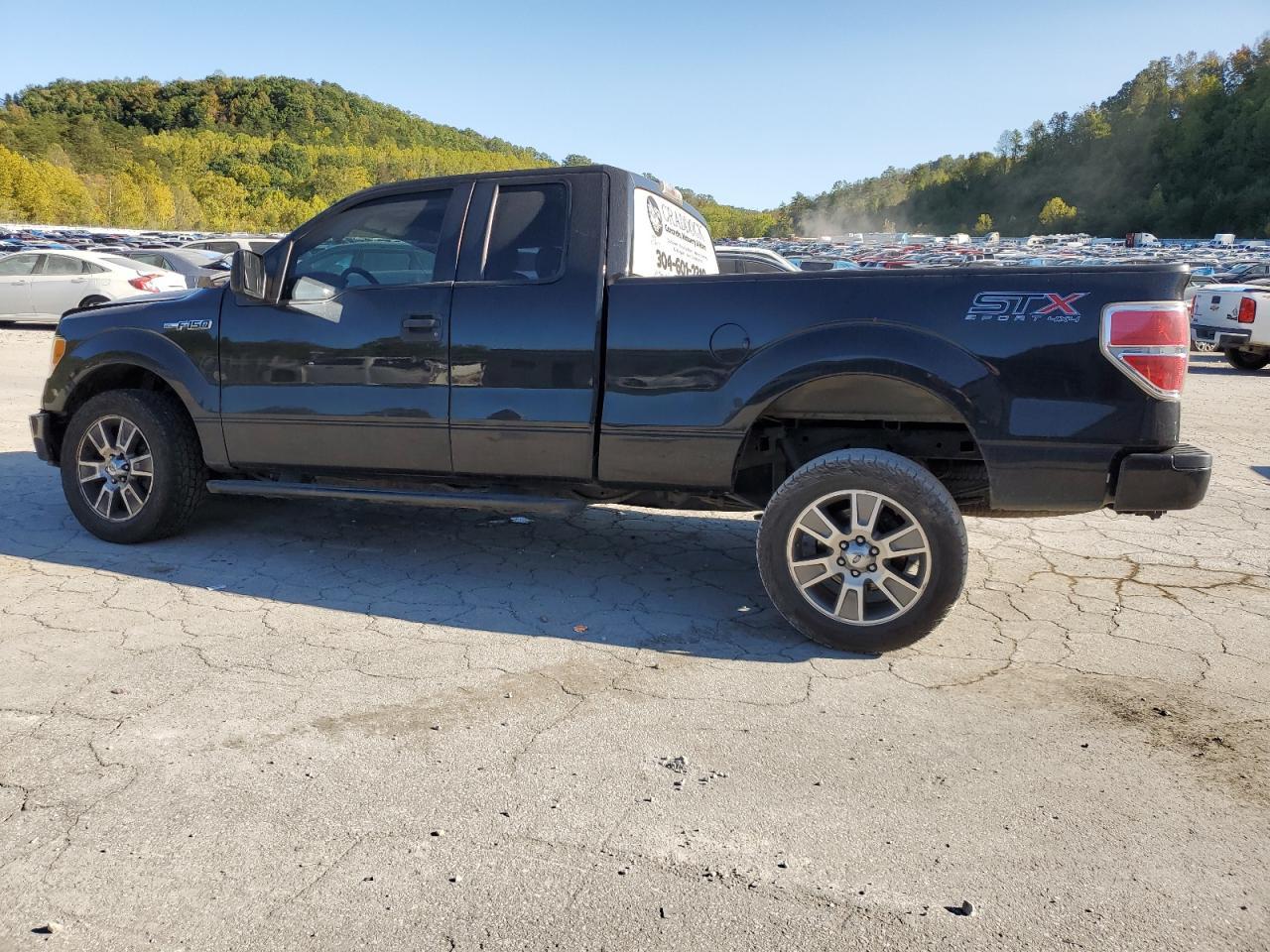 2014 Ford F150 Super Cab - Image 2
