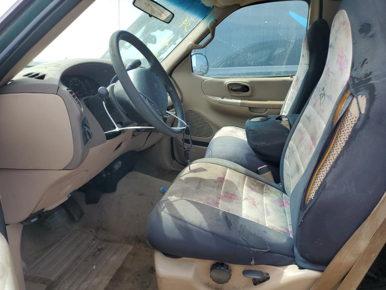 1999 Ford F150 - Фото 7