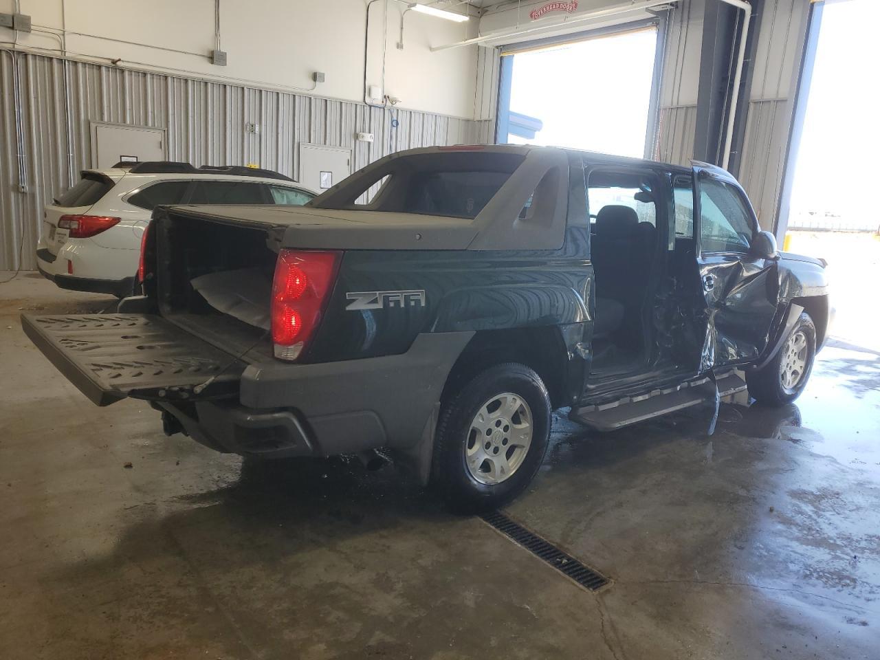 2002 Chevrolet Avalanche C1500 - Фото 3