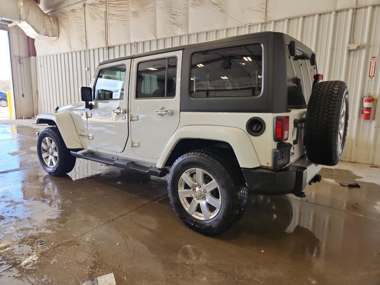 2013 Jeep Wrangler Unlimited Sahara - Фото 2